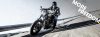 Harley-Davidson rider on mountain road on Dunlop tyres