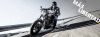 Piloto de Harley-Davidson en carretera de montaña con neumáticos Dunlop