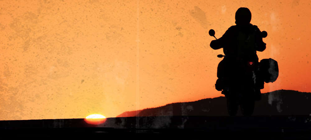 Dunlop Trailmax Meridian Reiter mit Sonnenuntergang