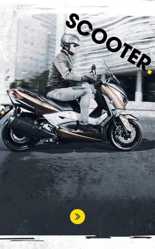 Yamaha Scooter rider on Dunlop tyres
